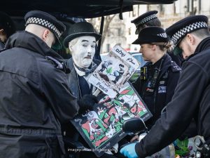 Read more about the article cops nick disabled Charlie Chaplin outside parliament