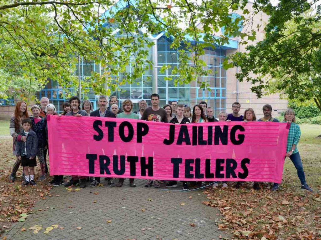 Read more about the article four more supporters jailed just as prisons overflow